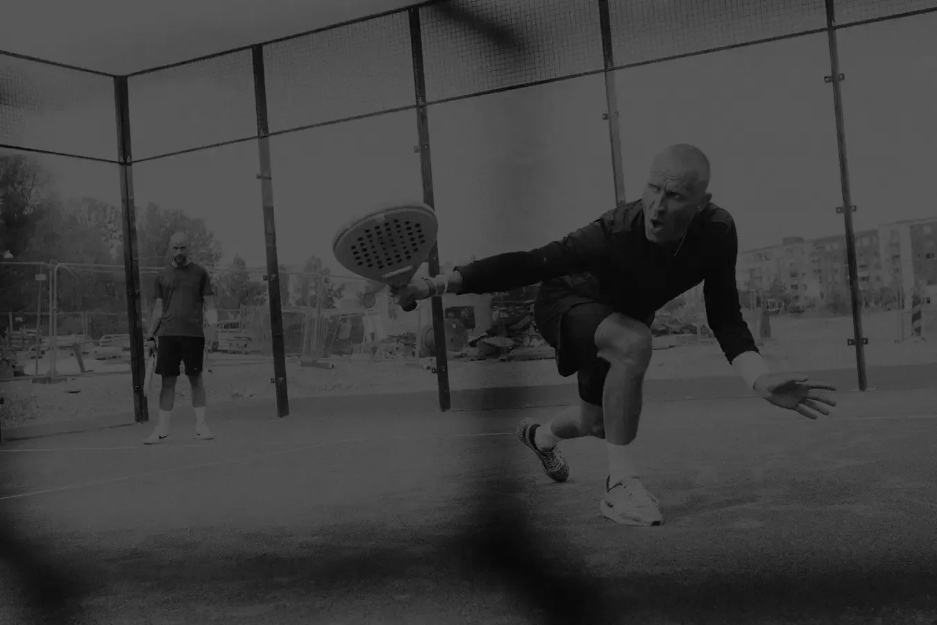 padel in action, man hitting a lob