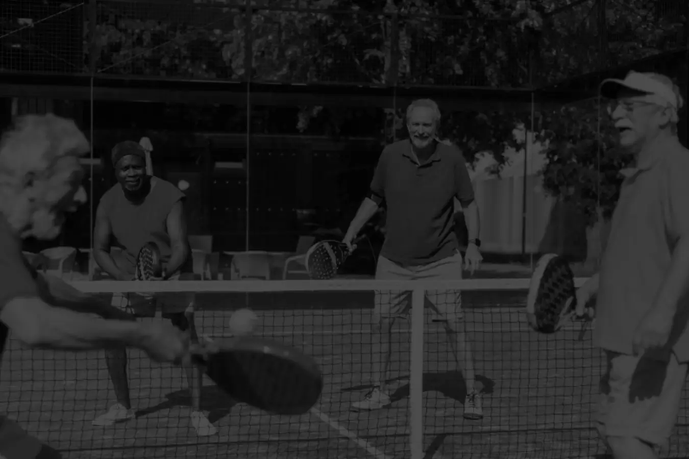 Seniors playing padel